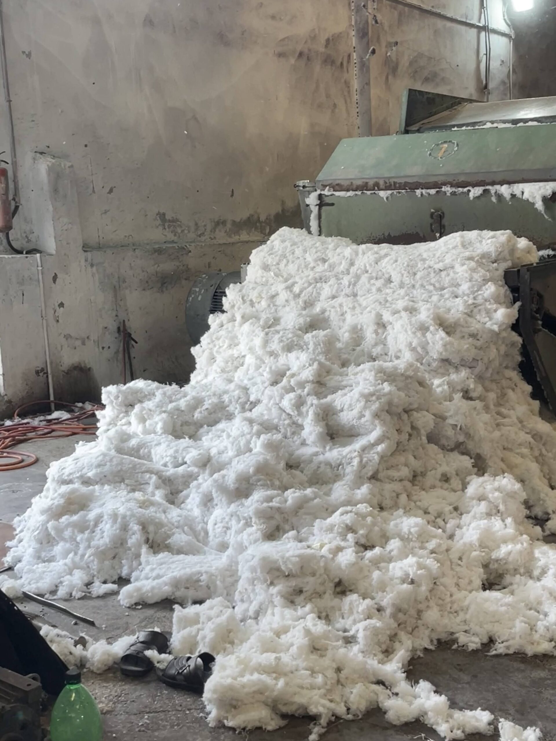 Piles of white cellulose fibres in a factory