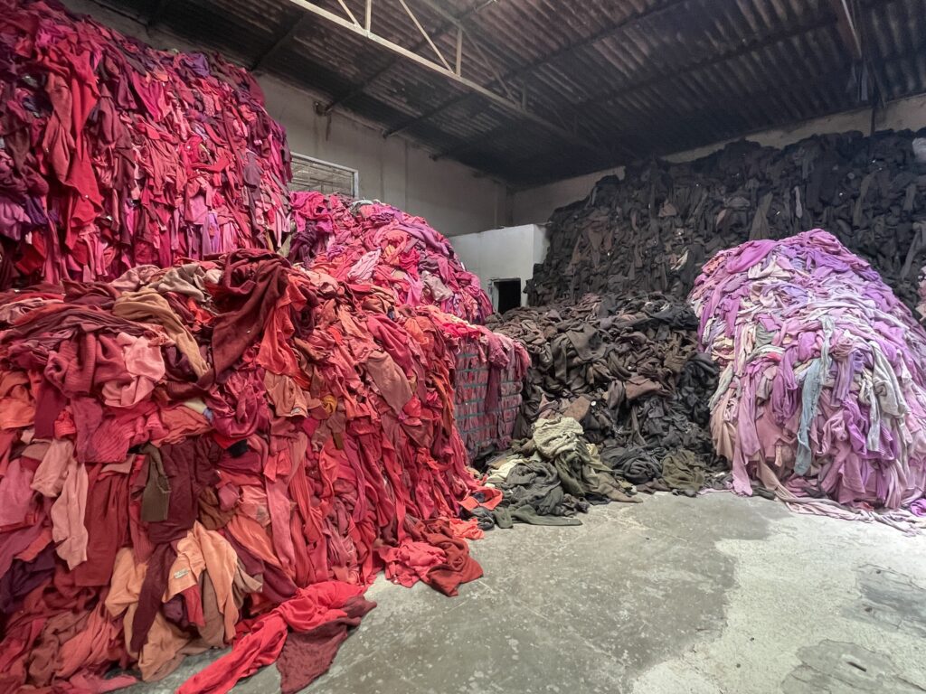 Piles of textile waste india factory post consumer